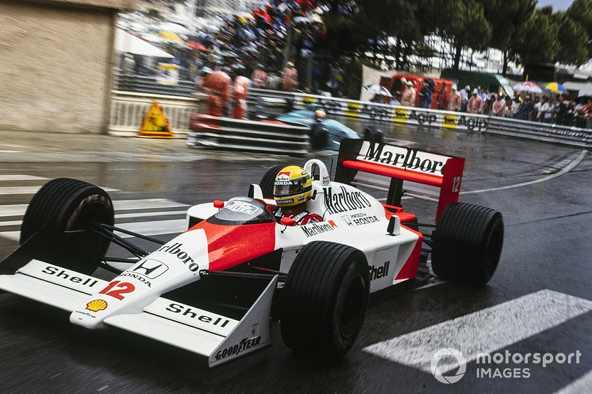 Ayrton Senna racing the McLaren MP4/4 F1 car in the rain